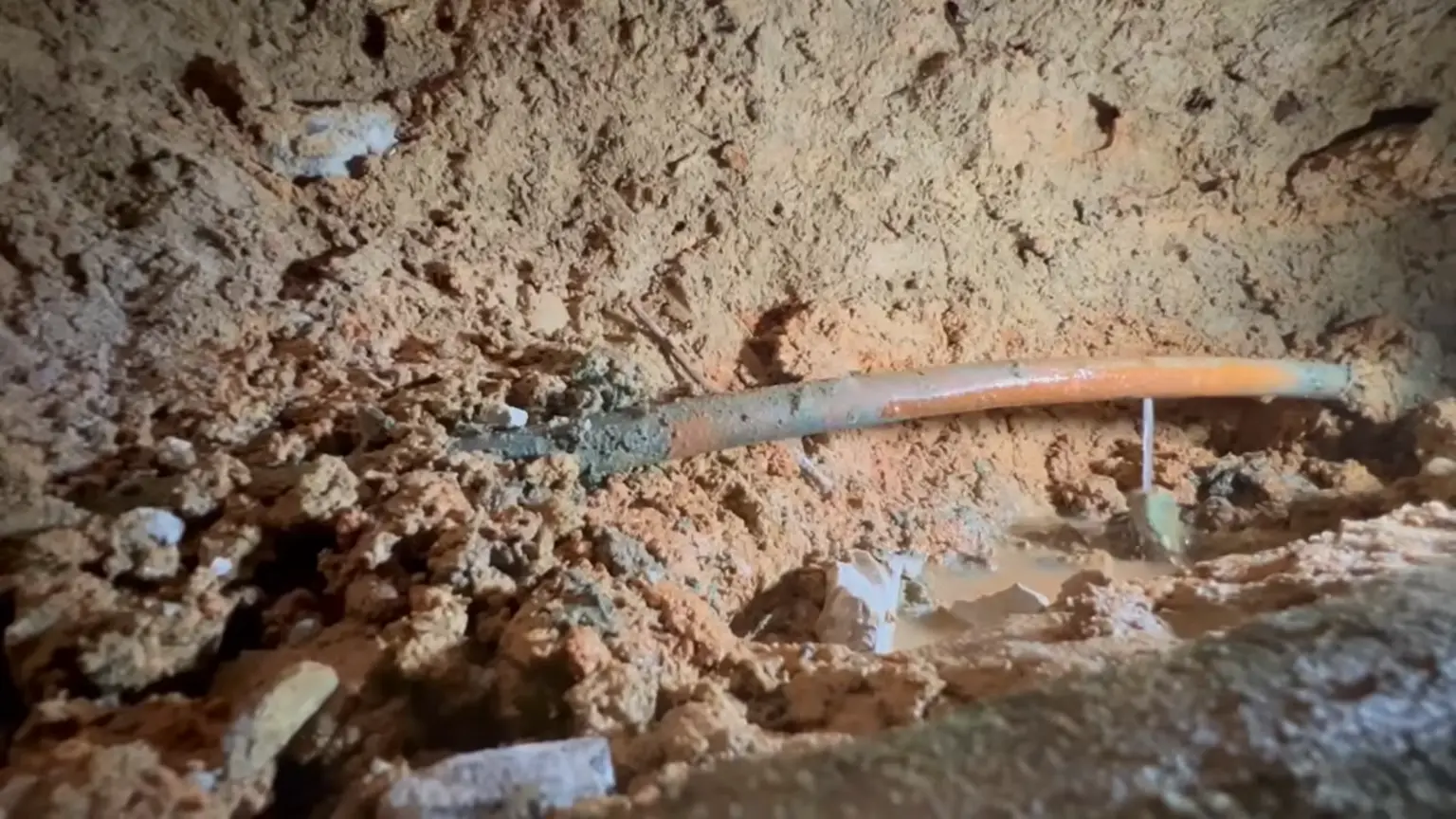 Residential water meter and main water line connection in Naples, Florida.